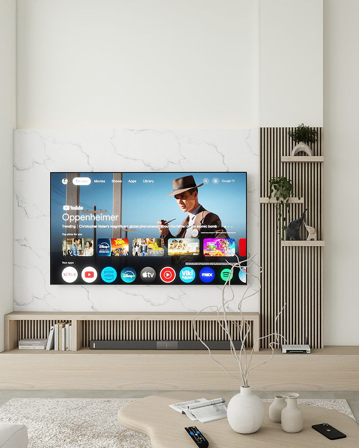 Modern TV wall with a light marble panel, low custom media unit and vertical wood slats