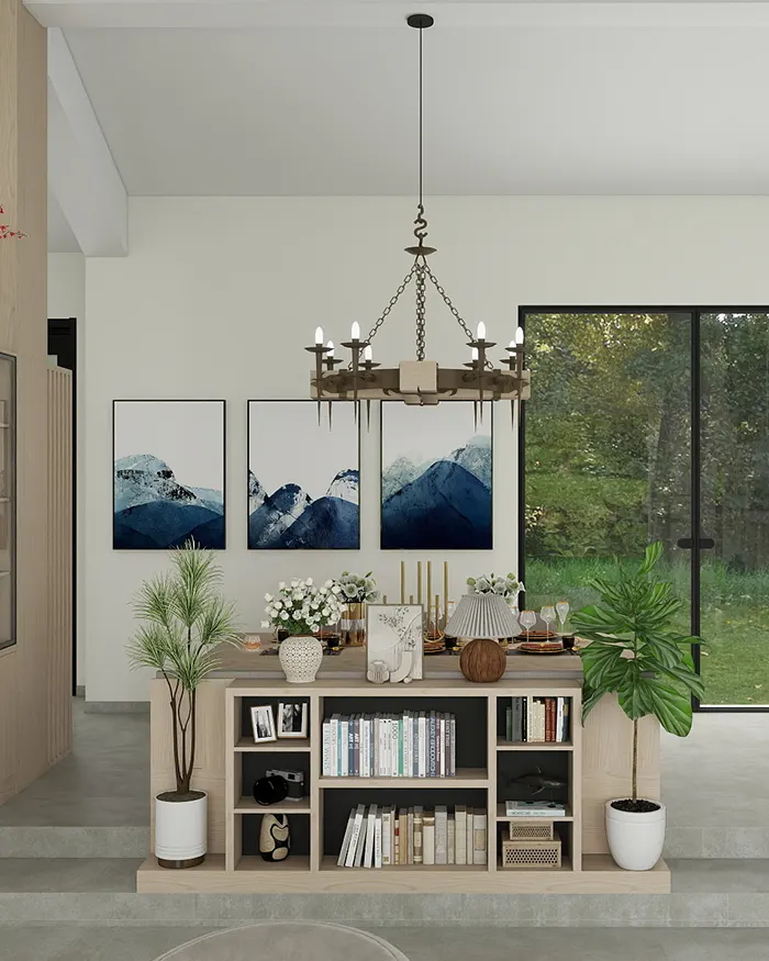 Dining area in a Kosmaj villa with custom bookshelves, blue artwork and abundant natural light