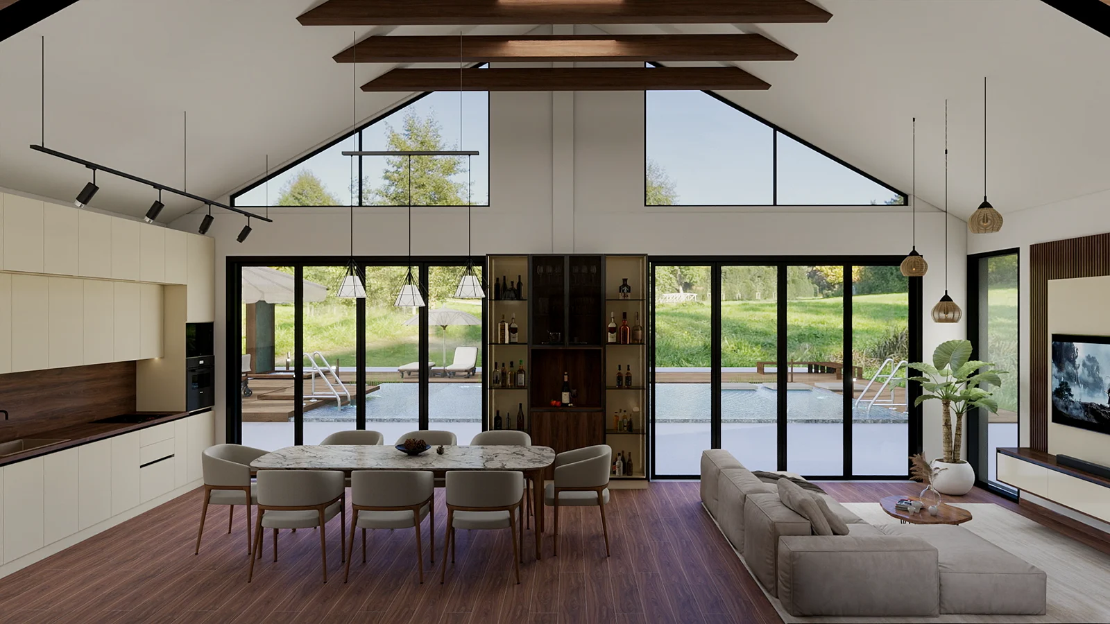 Spacious open-plan dining room and living area with a marble table, vaulted ceiling and floor-to-ceiling windows.