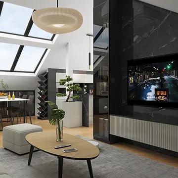 A modern living room interior with skylights, sleek black accents, and perfectly tailored furniture - designed to defy expectations.